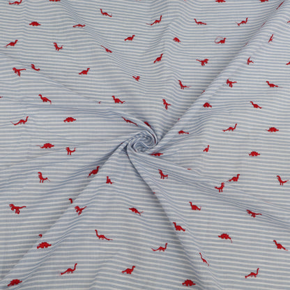 Fabric with red dinosaur pattern on blue and white striped background