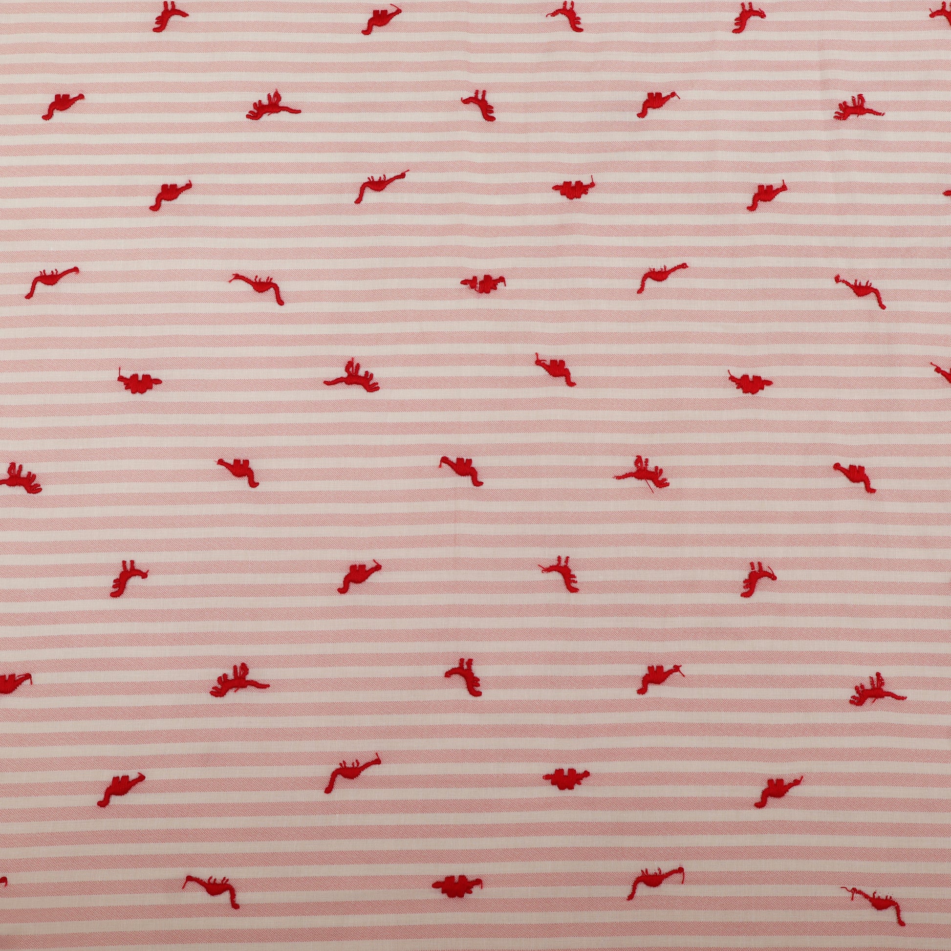 Red pattern on a pink striped background