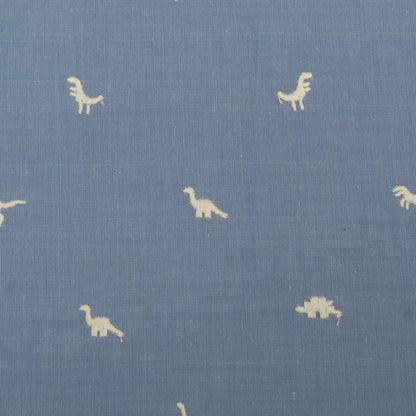 Blue fabric with small white dinosaur prints