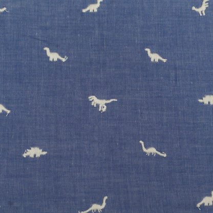 Blue fabric with white dinosaur patterns