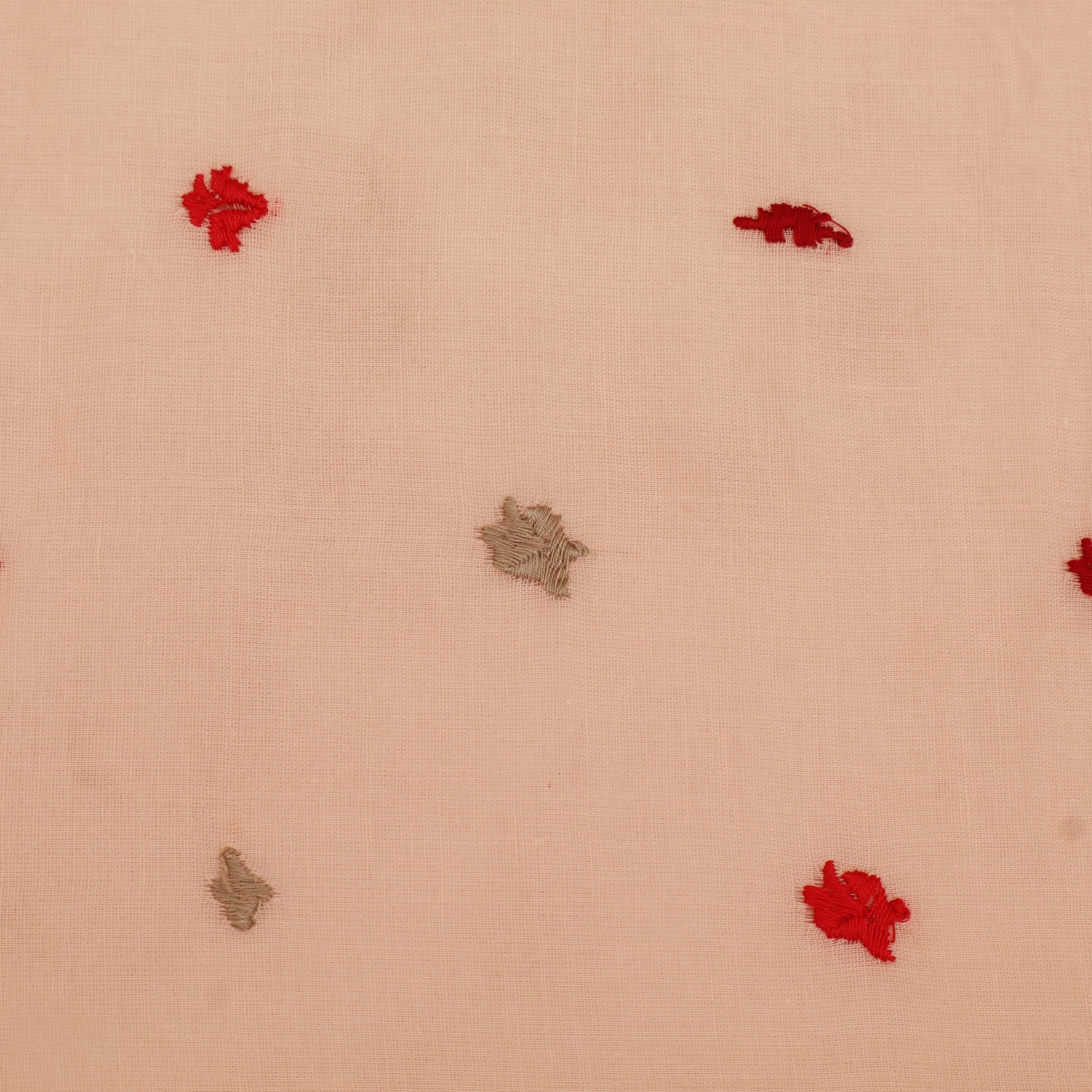 Beige fabric with red and brown embroidered patterns