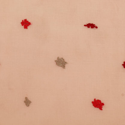 Beige fabric with red and brown embroidered patterns