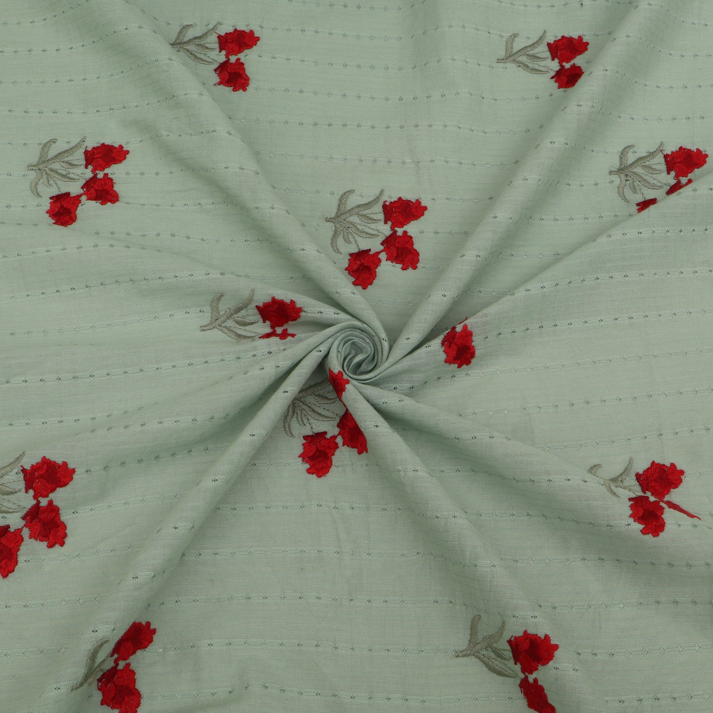 Light green fabric with red floral embroidery