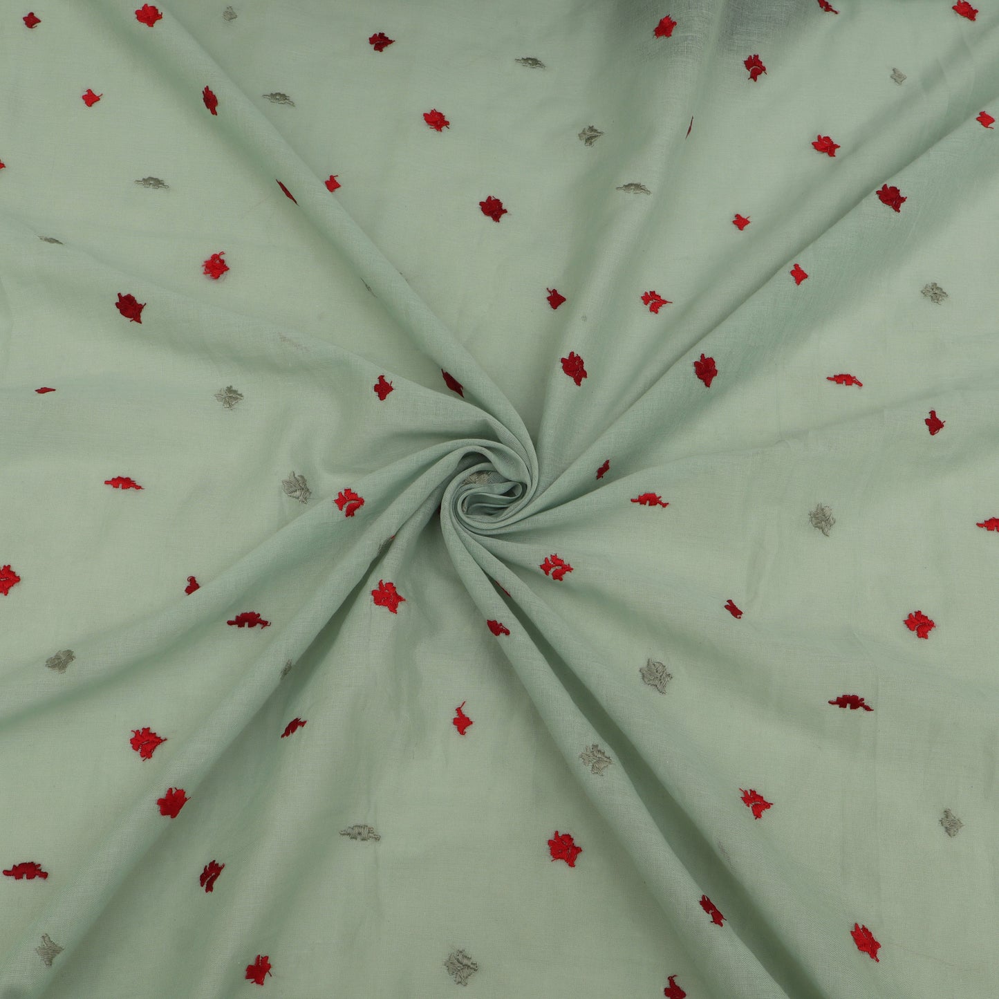 Light green fabric with red and gray floral patterns