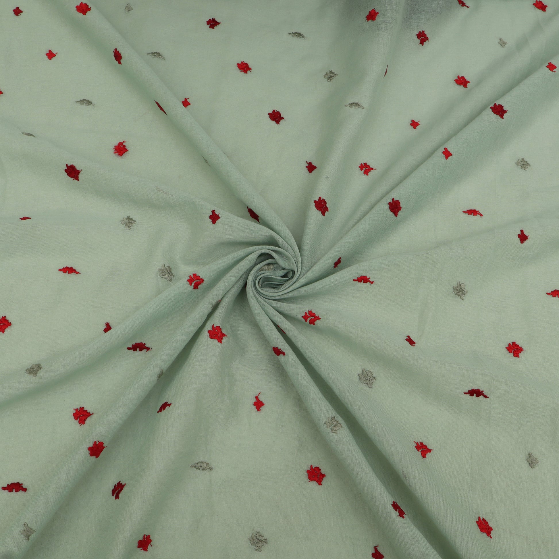 Light green fabric with red and gray floral patterns