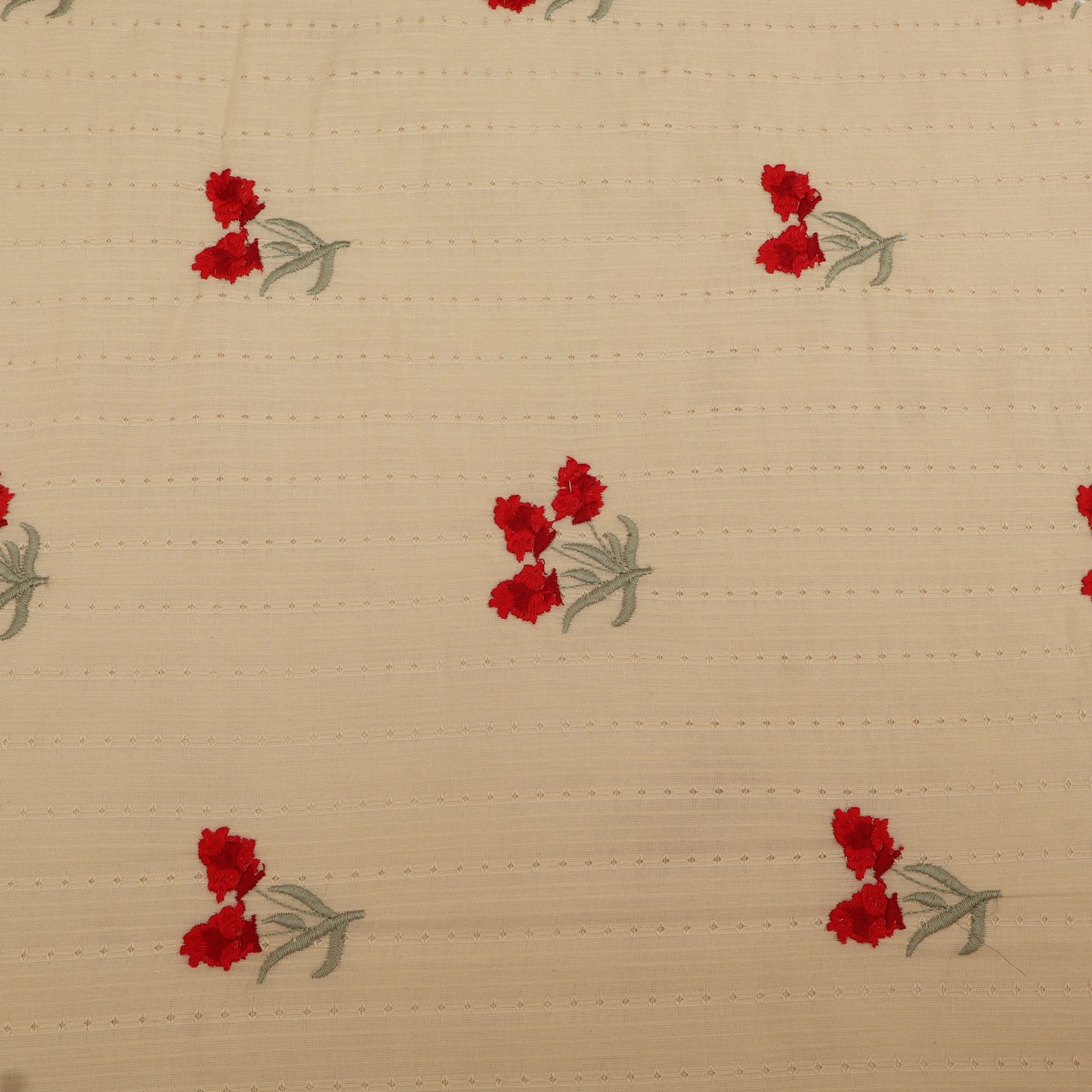 Beige fabric with red floral patterns