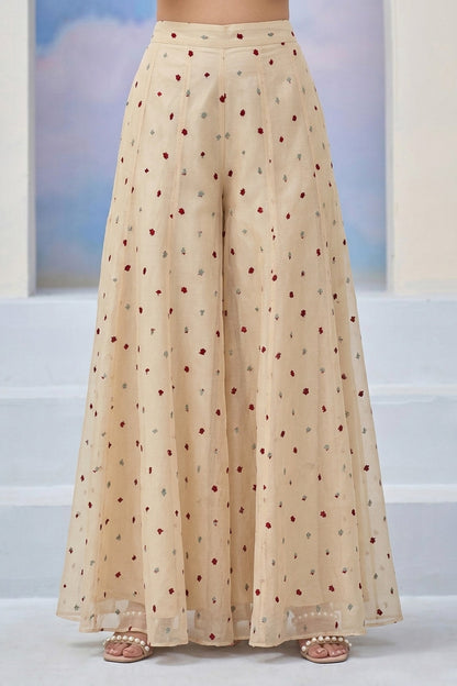 Beige polka dot skirt on a white background
