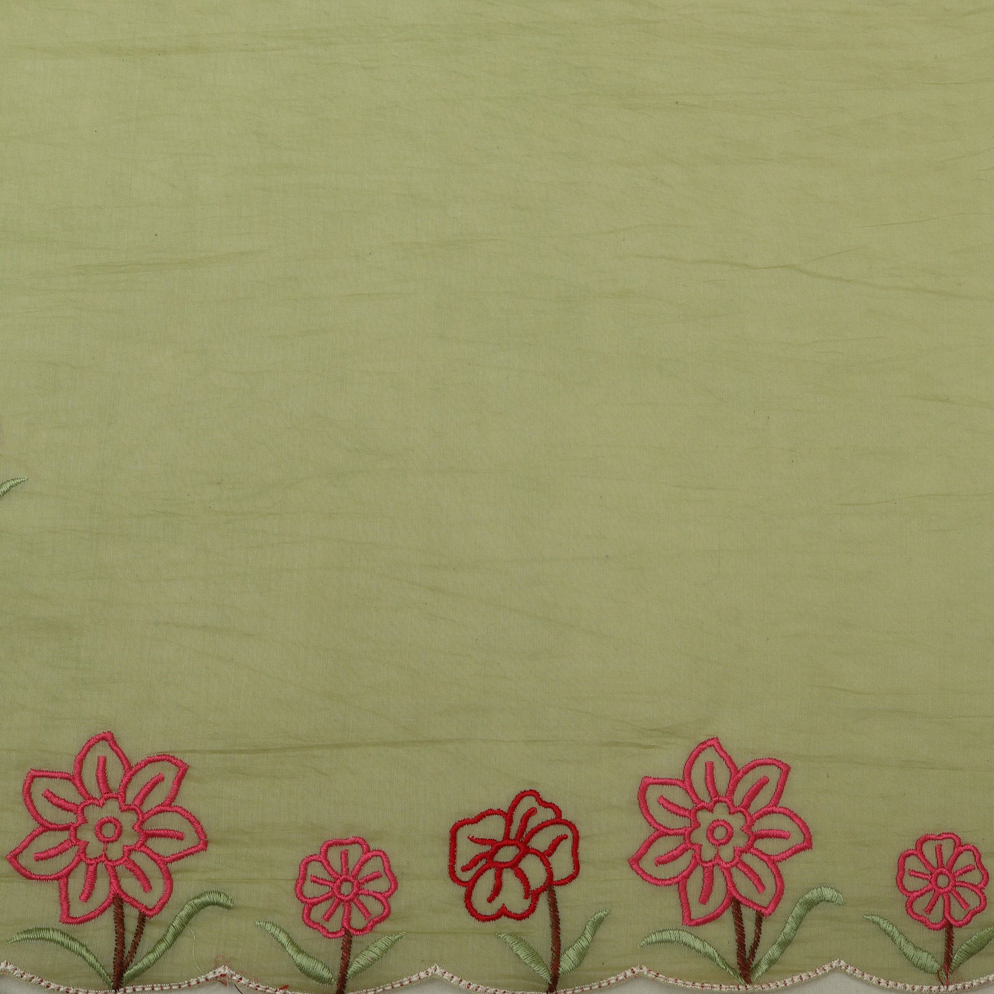Green fabric with red floral embroidery