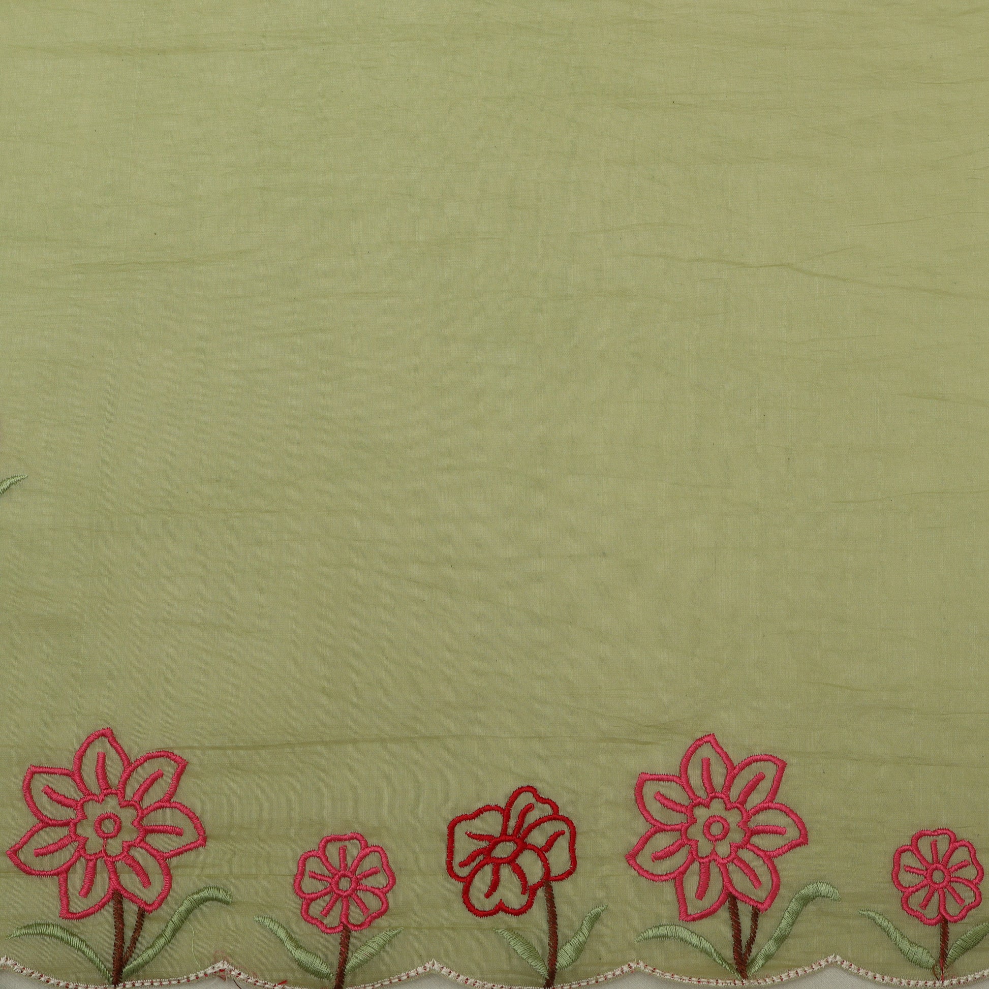 Green fabric with red floral embroidery