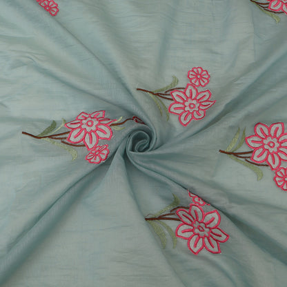 Light blue fabric with pink floral embroidery
