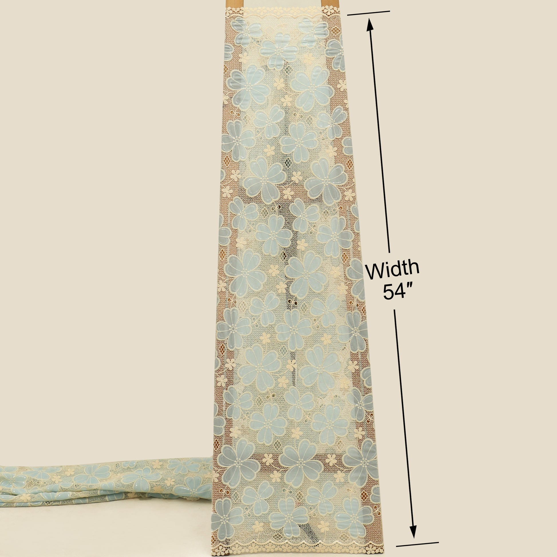 Floral patterned fabric with a width measurement of 54 inches on a beige background