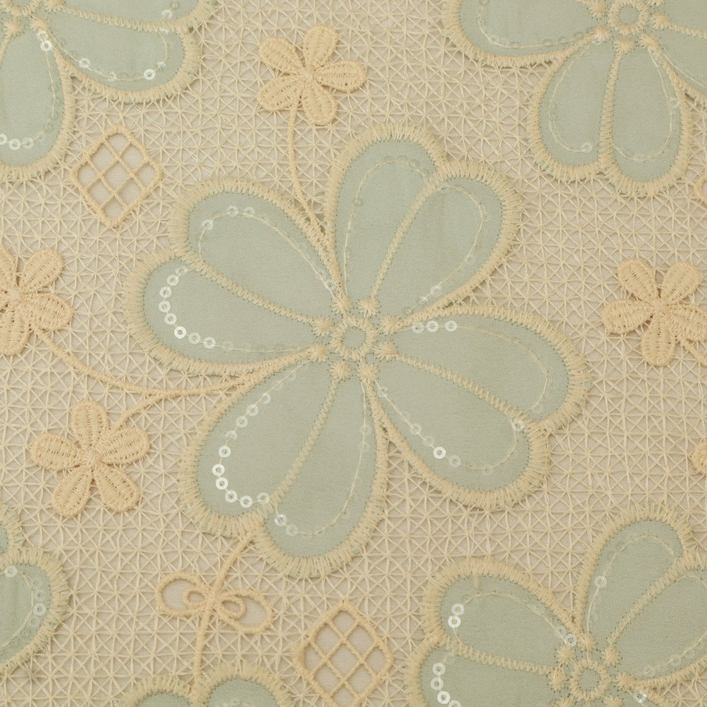 Decorative fabric with floral patterns in green and beige on a beige background