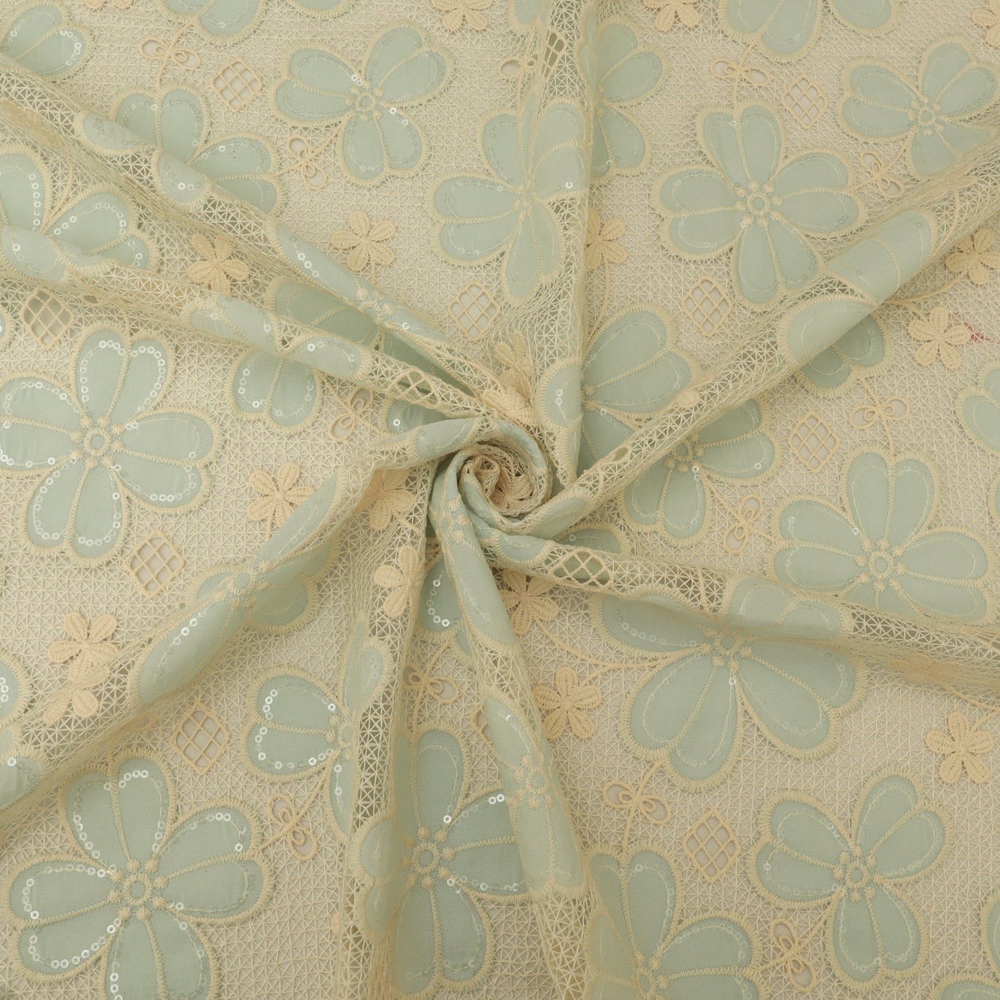 Floral lace fabric with a beige background