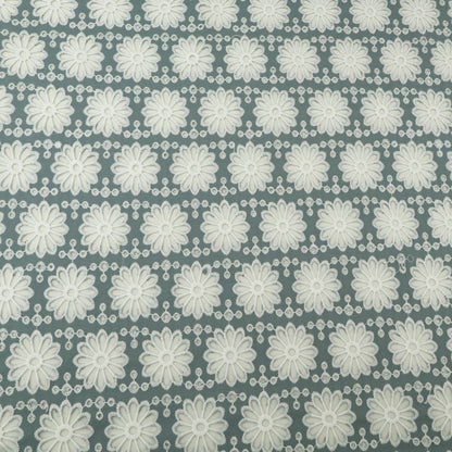 Pattern of white flowers on a gray background