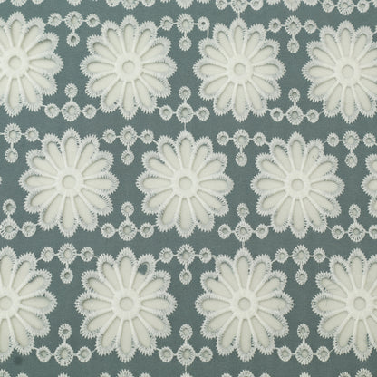 Pattern of white flowers on a gray background