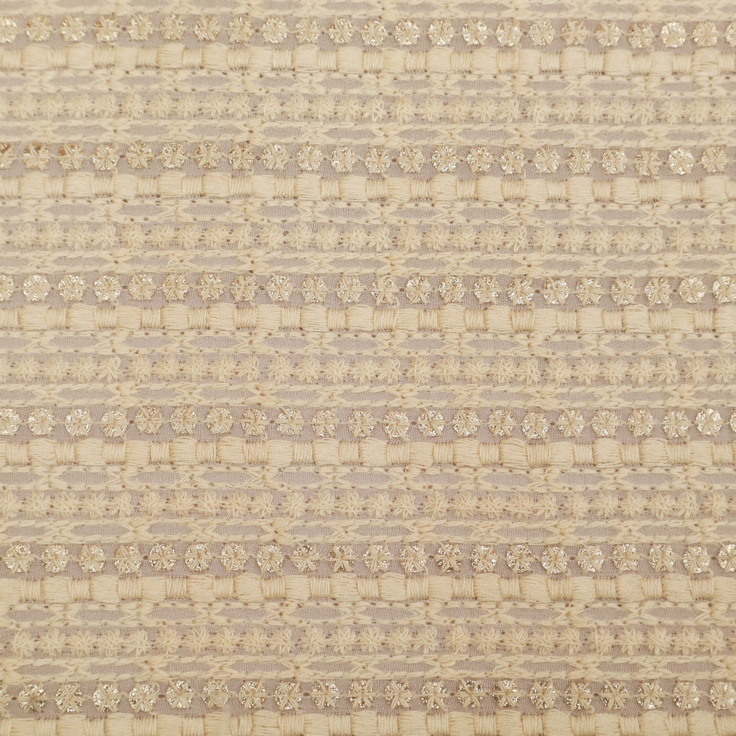 Textured fabric pattern with a subtle floral design on a beige background