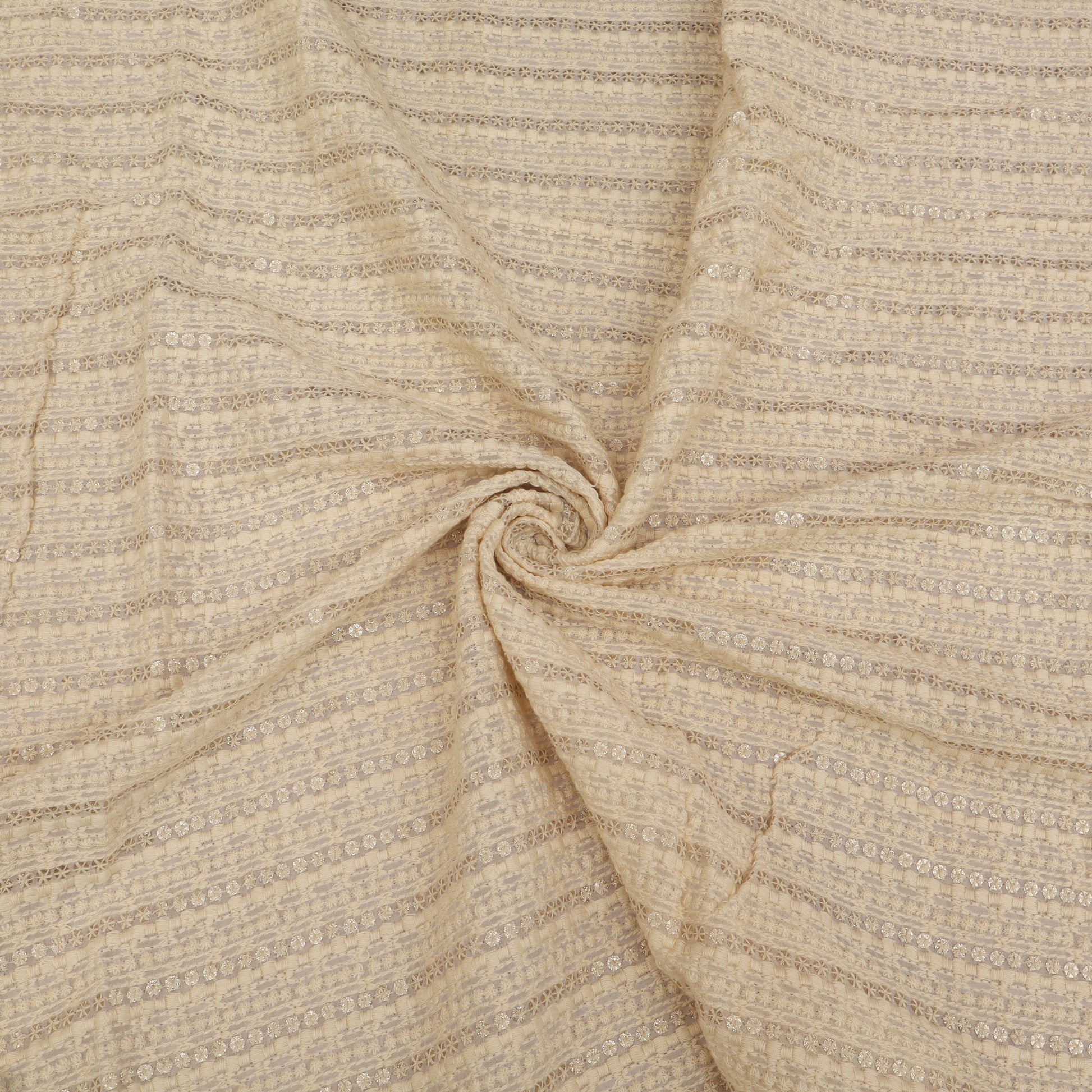 Close-up of beige fabric with subtle pattern
