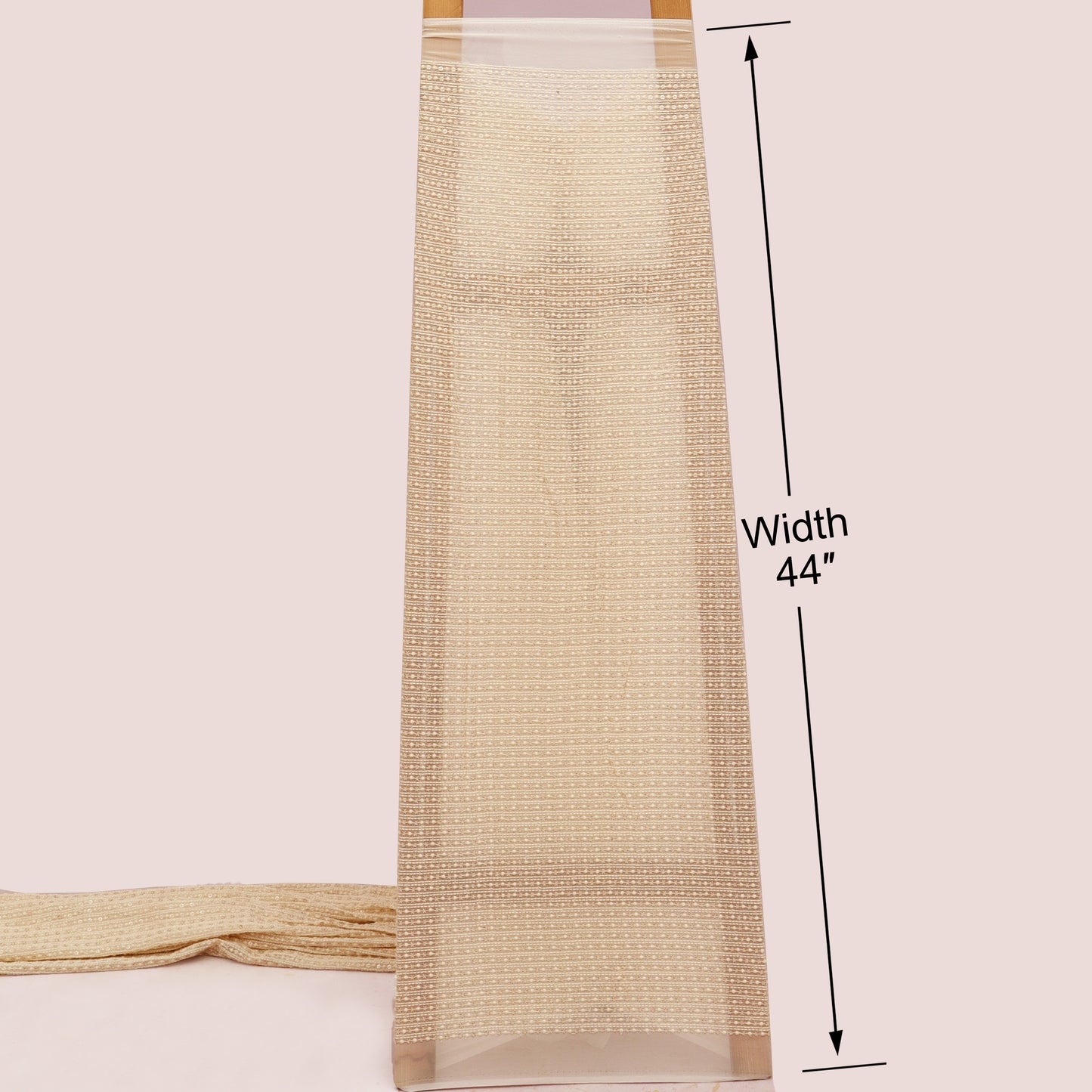 Beige woven blind with a measurement label indicating width 44 inches on a light pink background