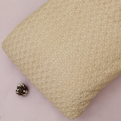 Beige textured pillow on a light pink background
