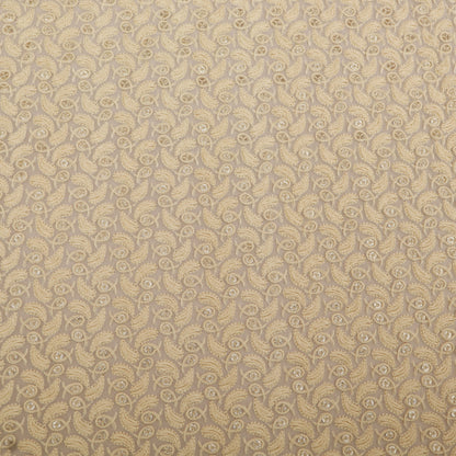 Patterned fabric with a beige and brown color scheme