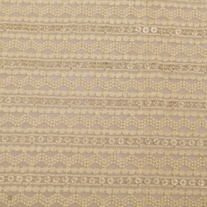Beige fabric with intricate pattern