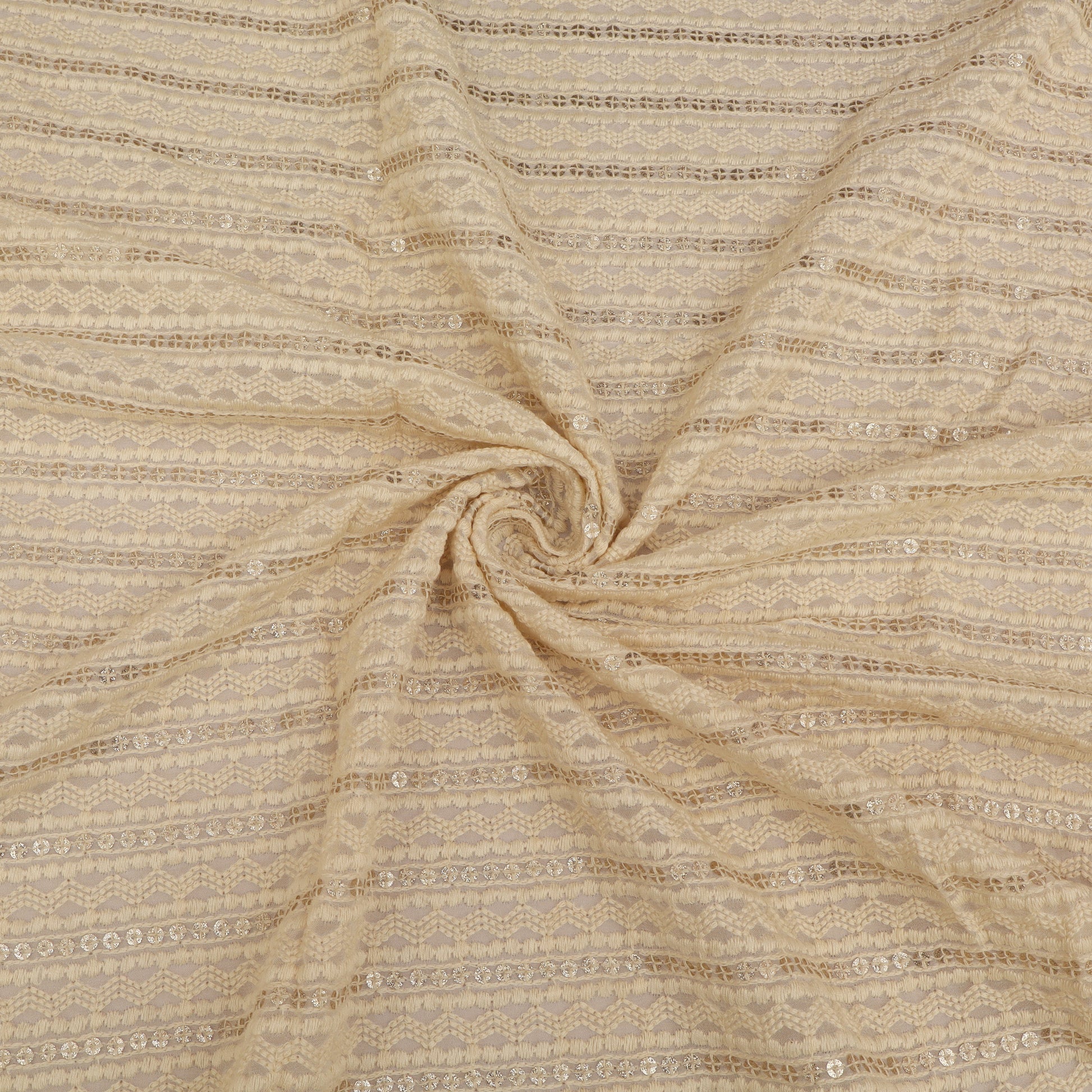 Textured beige fabric with a subtle pattern