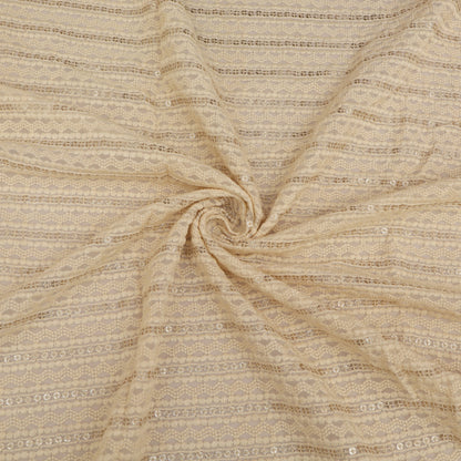 Textured beige fabric with a subtle pattern