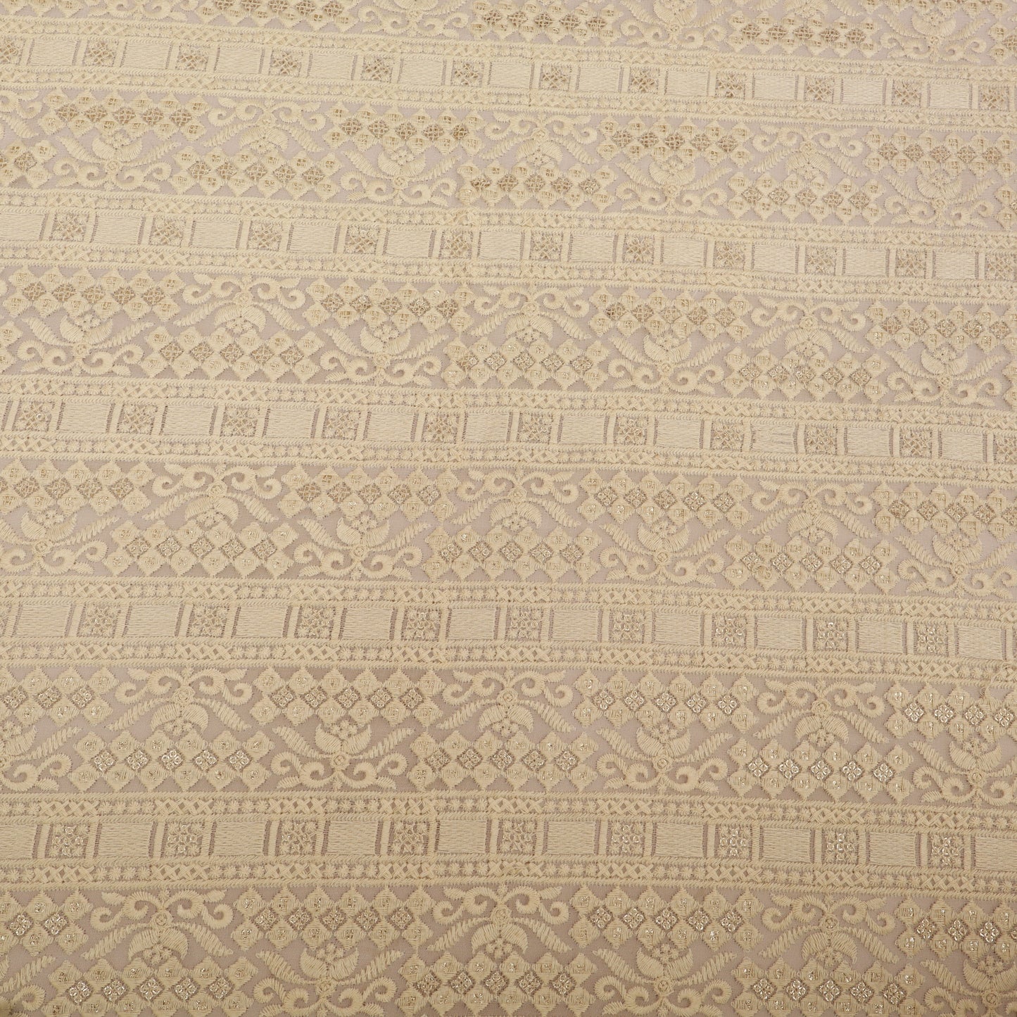 Patterned fabric with geometric design in beige tones