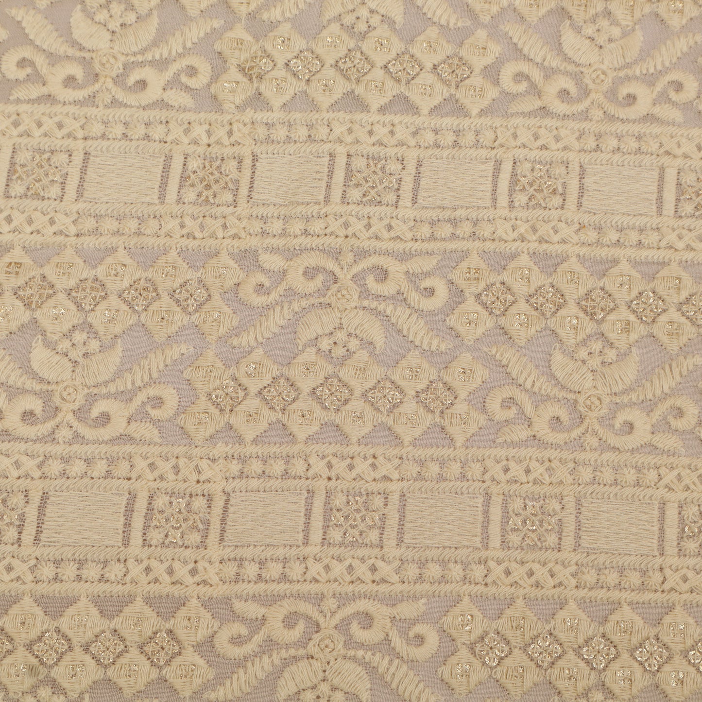 Decorative fabric pattern with intricate designs on a beige background