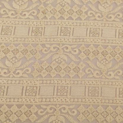 Decorative fabric pattern with intricate designs on a beige background