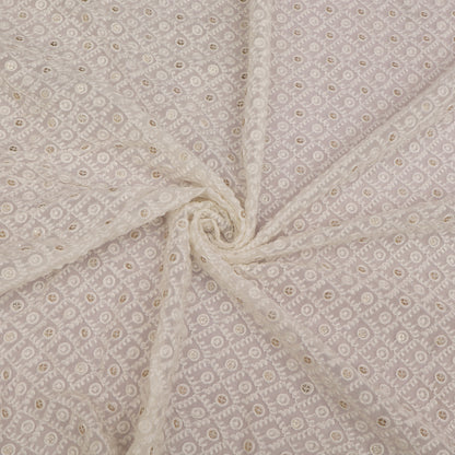 Floral patterned fabric with a swirl design on a neutral background