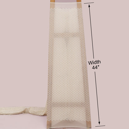 Beige textured fabric with a measurement label indicating width 44 inches on a light pink background.
