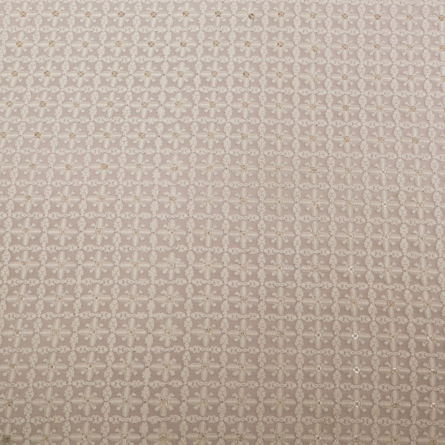 Textured fabric pattern with a subtle geometric design on a beige background