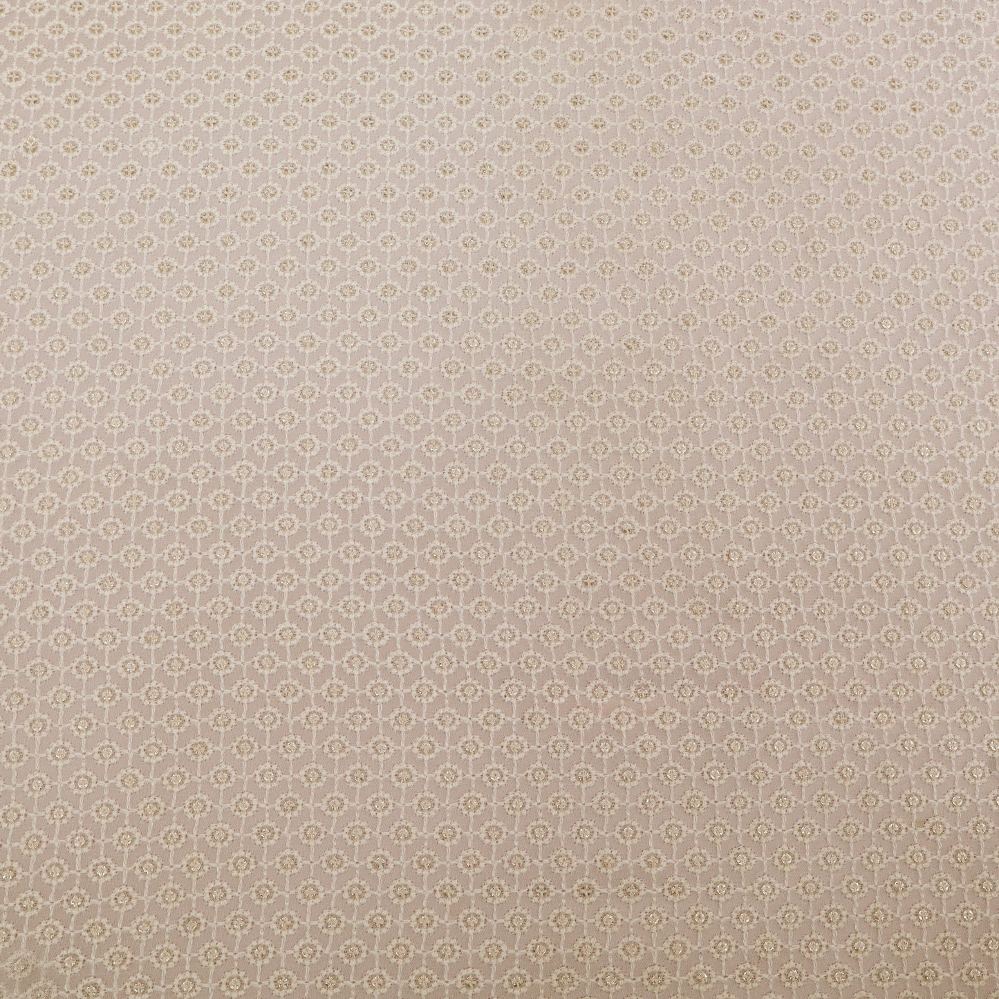 Patterned fabric swatch with small geometric design on a White background