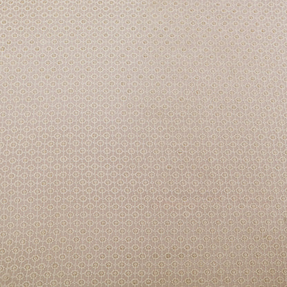 Patterned fabric swatch with small geometric design on a White background