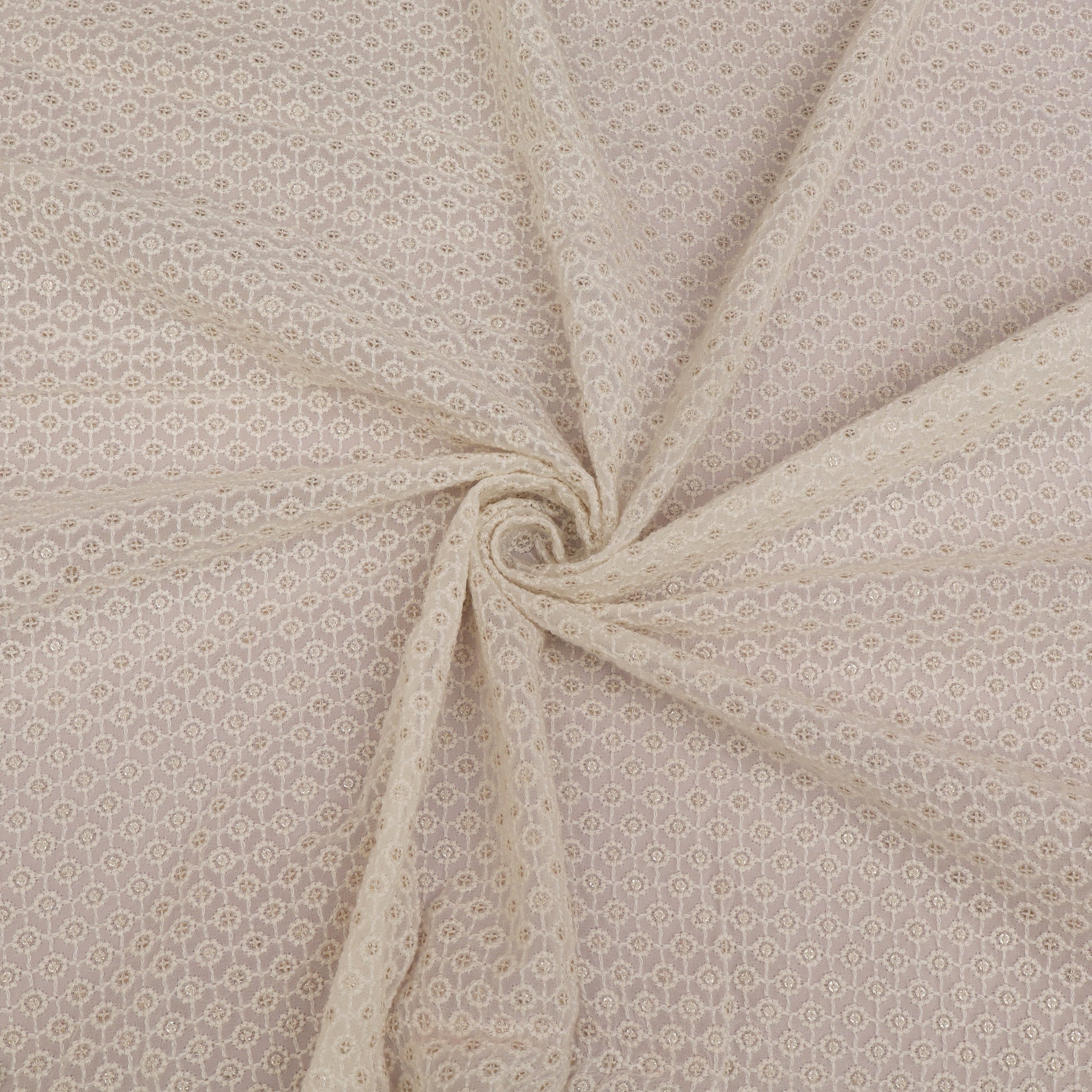 White  fabric with a subtle pattern, folded in a way that highlights its texture.