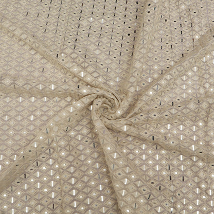 Textured White pillow with a small pine cone on a White background
