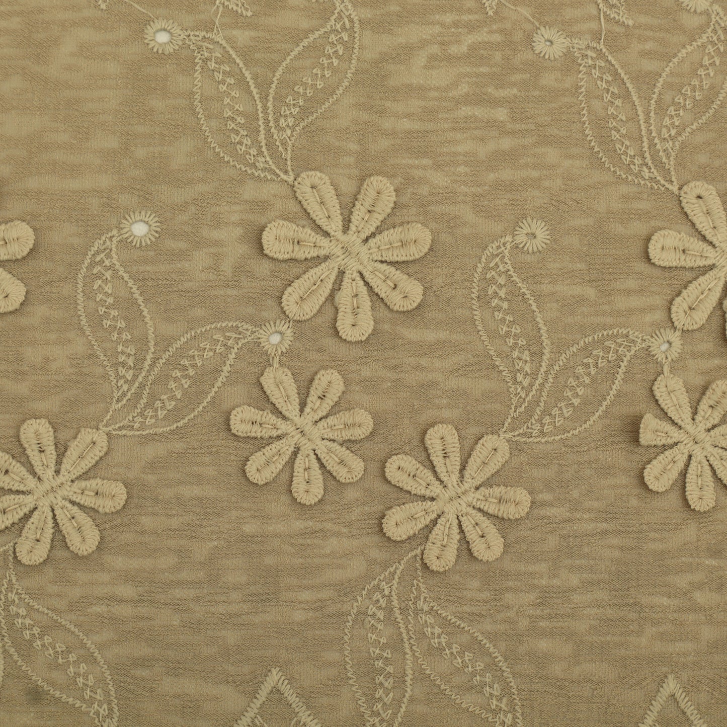 Beige floral embroidery pattern on a textured beige fabric background