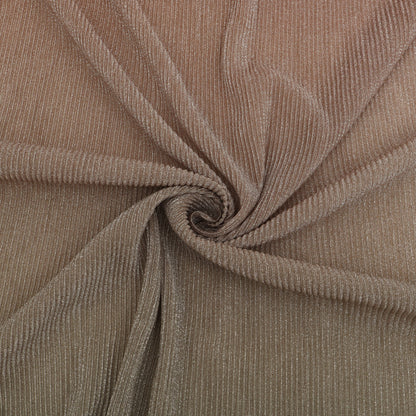 Close-up of brown ribbed fabric with a swirl pattern
