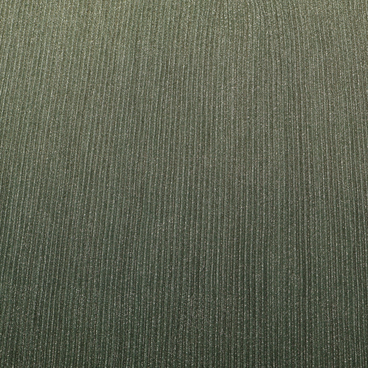 Close-up of a textured green fabric surface