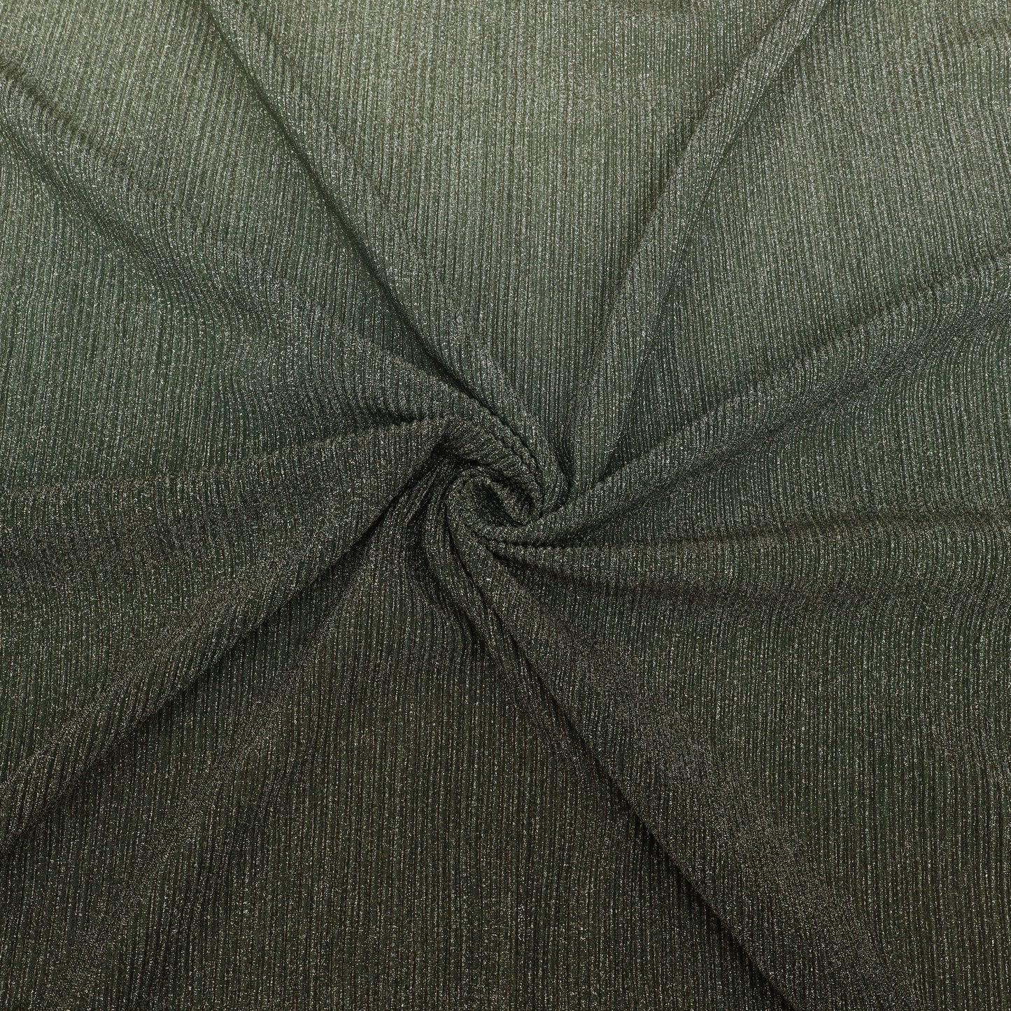 Close-up of dark green fabric with a textured pattern