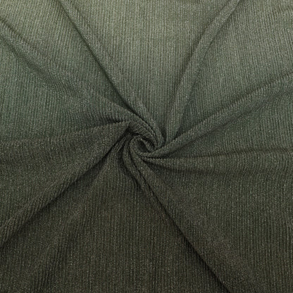 Close-up of dark green fabric with a textured pattern