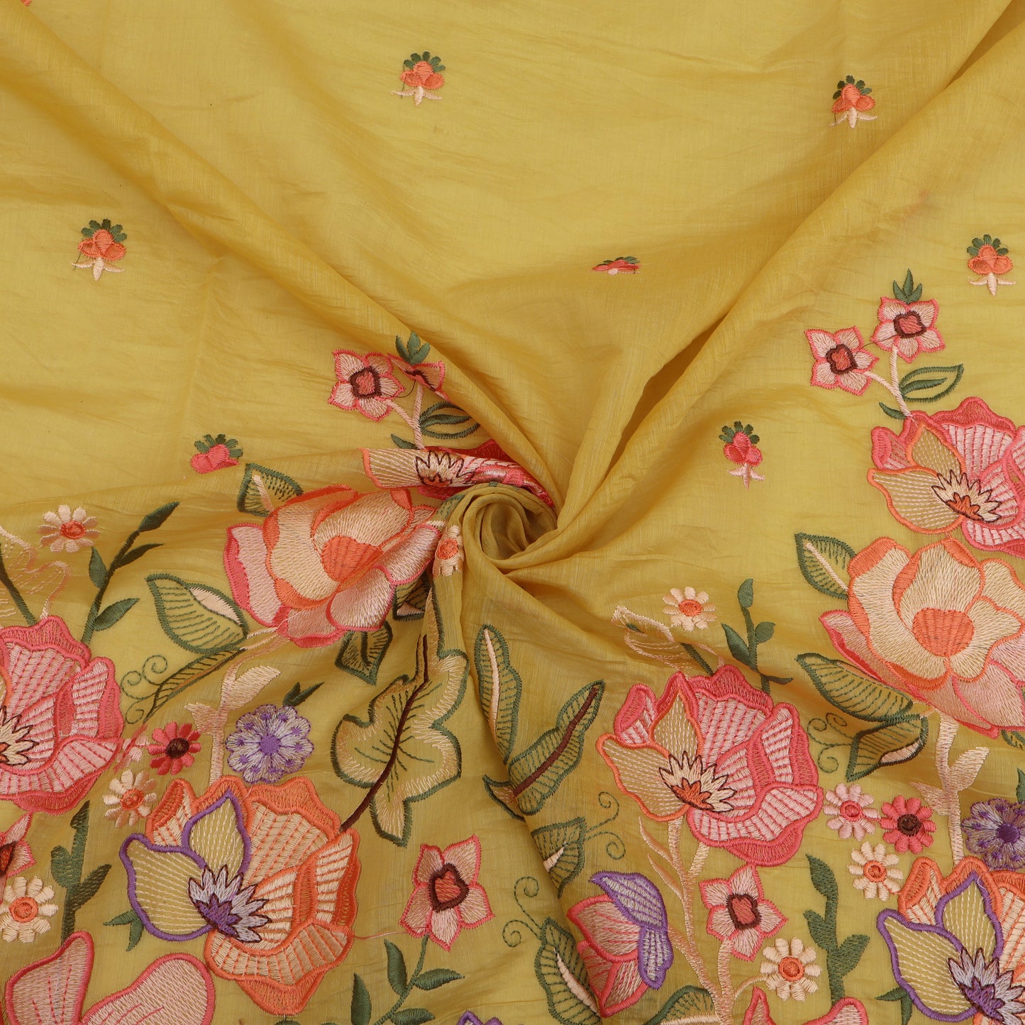 Embroidered fabric with floral patterns on a yellow background