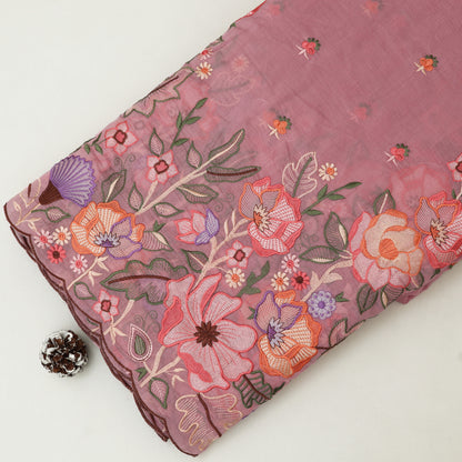 Embroidered fabric with floral patterns on a white background