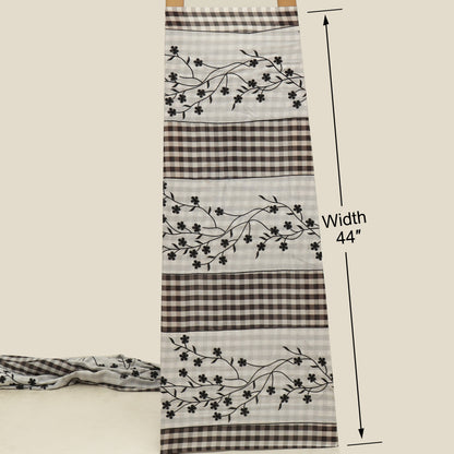 Fabric with floral pattern and checkered design, displayed on a white background with measurements.