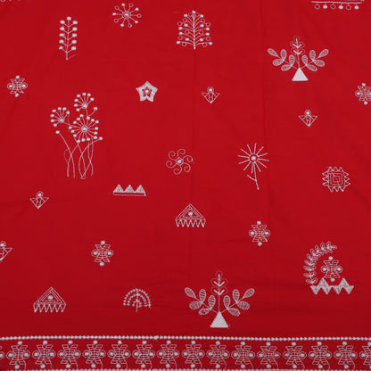 Red fabric with white geometric patterns