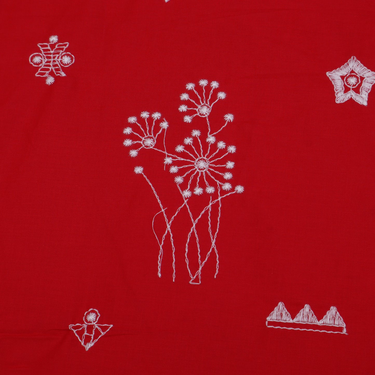 White floral and geometric patterns on a red background
