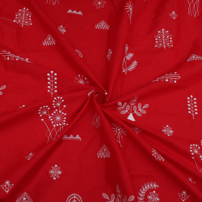 Red fabric with white floral patterns