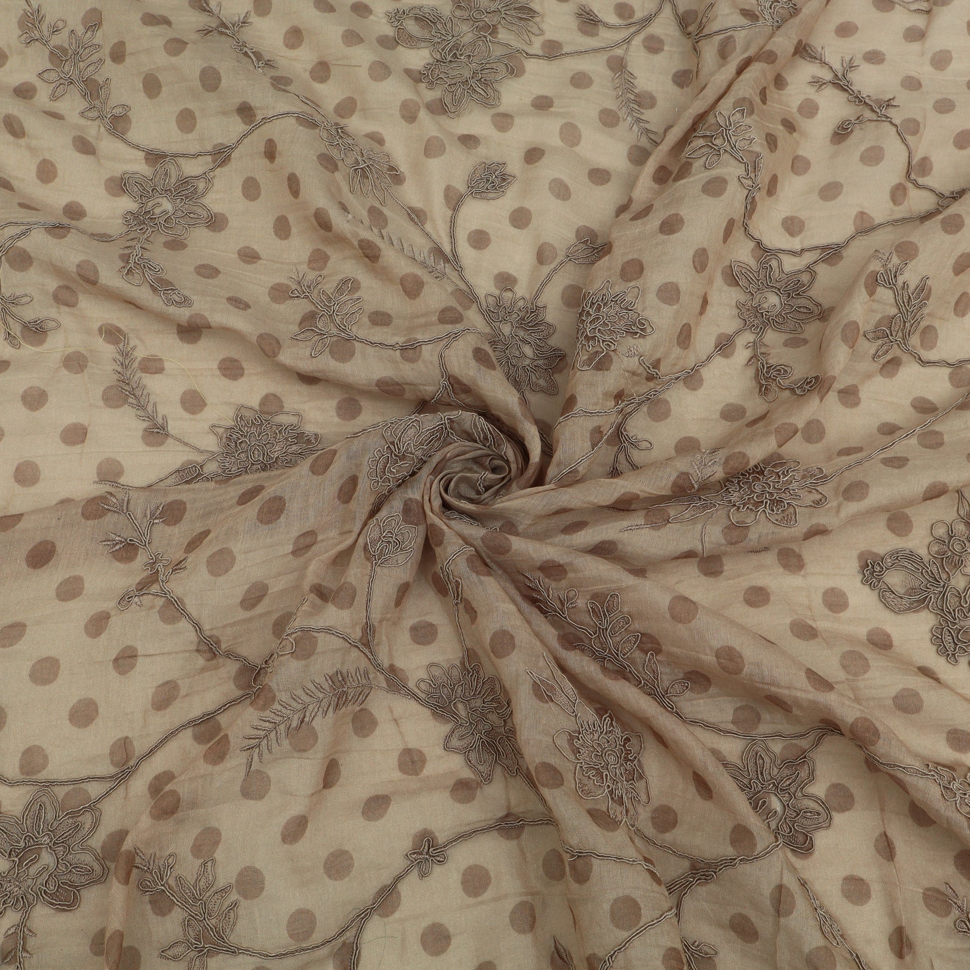 Beige fabric with brown floral patterns