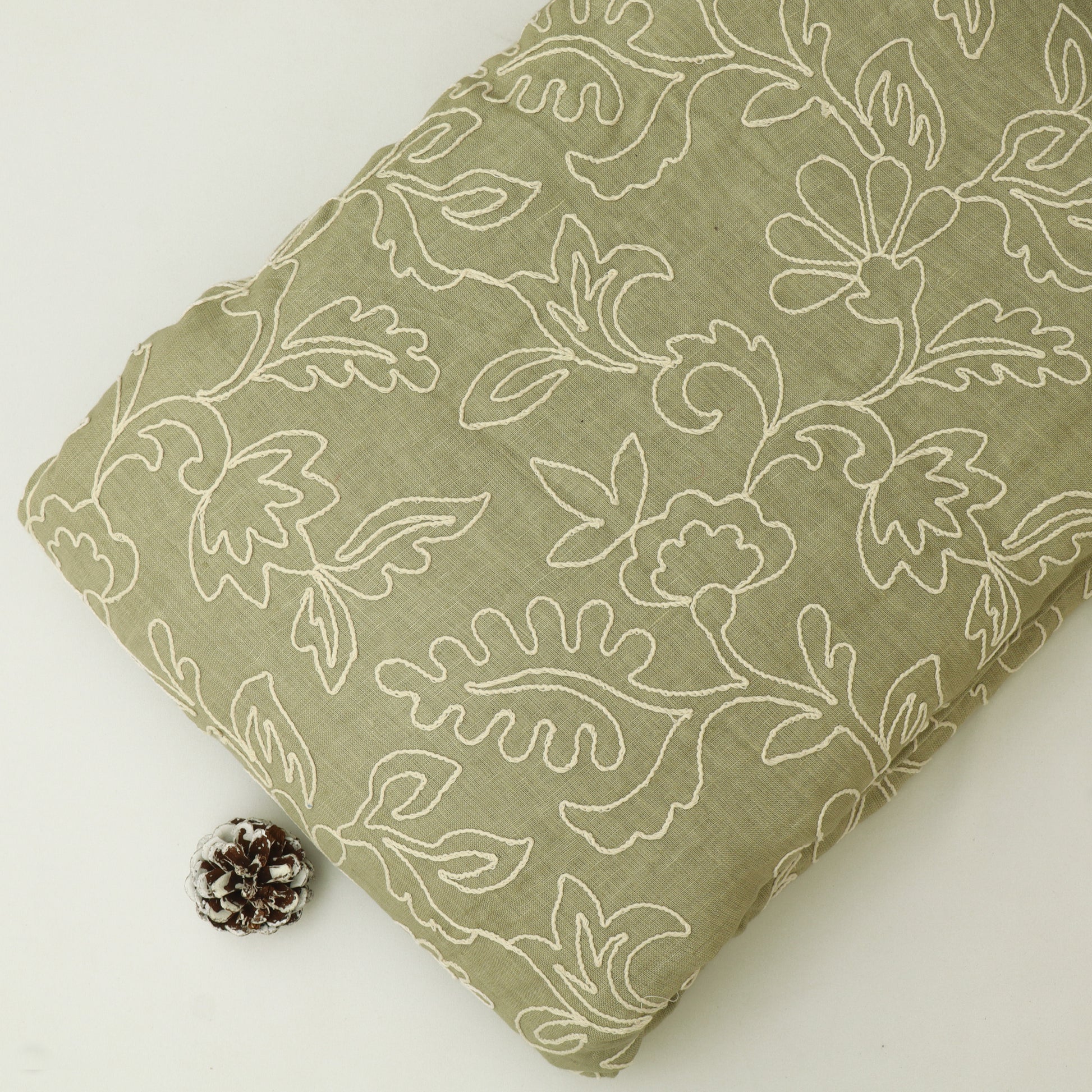 Folded fabric with floral pattern on a white background